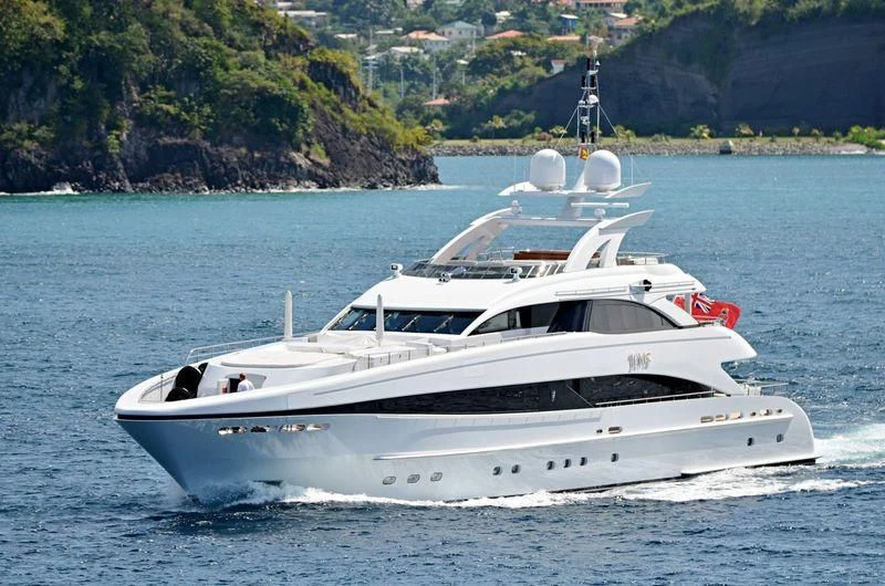 a white yacht on the water aboard JEMS Yacht for Sale