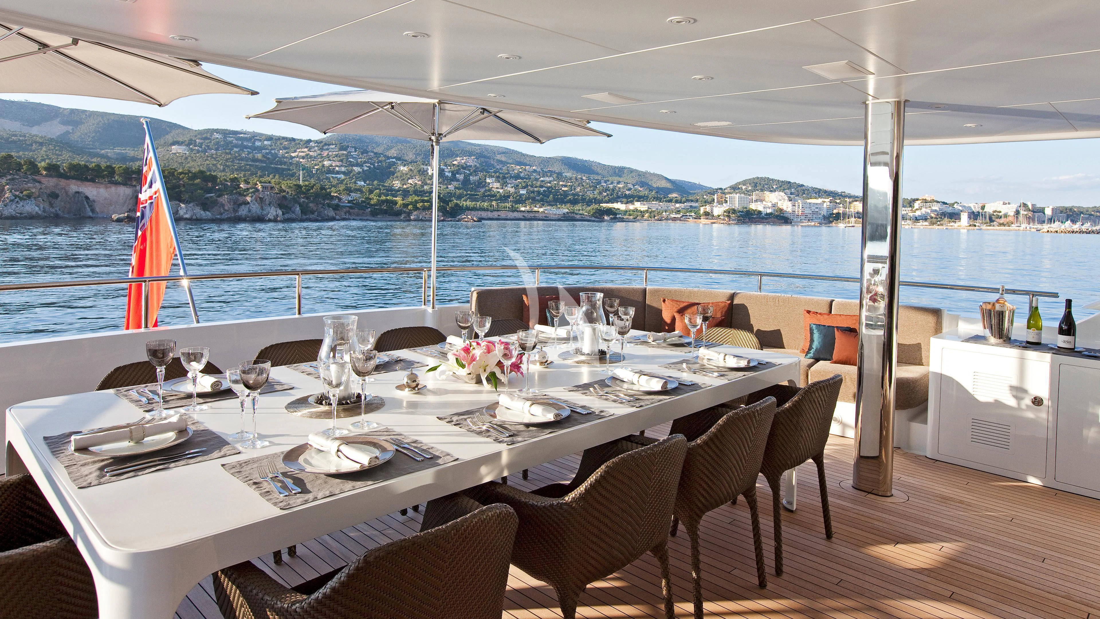 a table set for a meal aboard JEMS Yacht for Sale