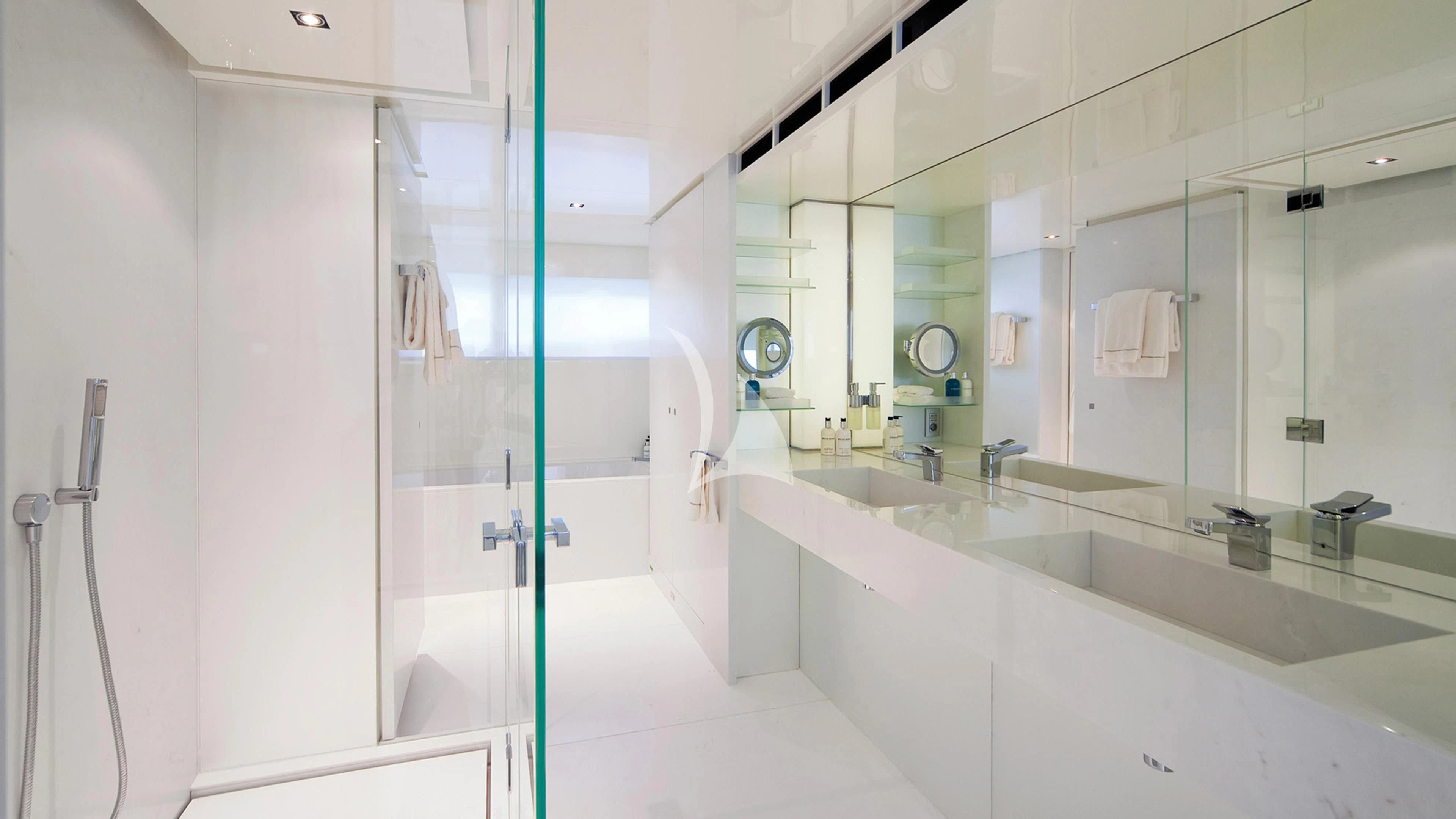 a bathroom with a glass shower aboard JEMS Yacht for Sale