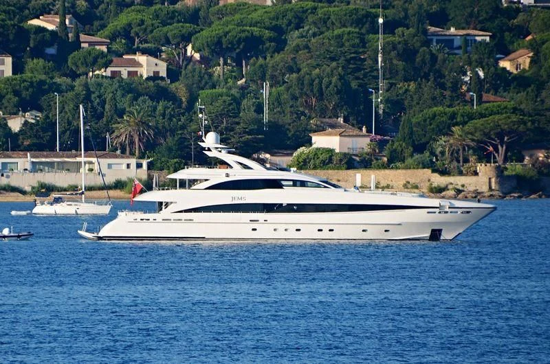 a white yacht in the water aboard JEMS Yacht for Sale