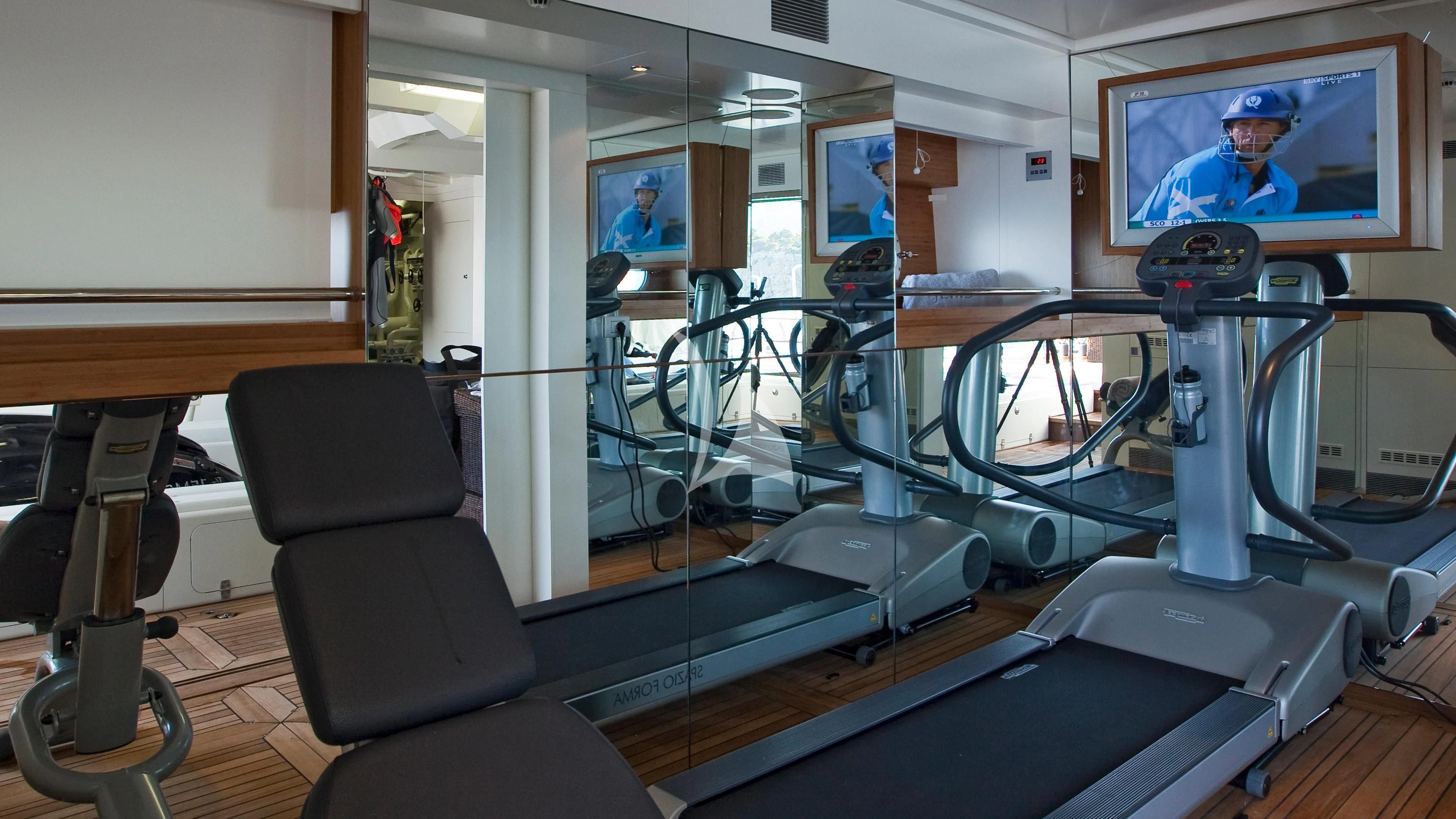 a gym with exercise equipment aboard JEMS Yacht for Sale