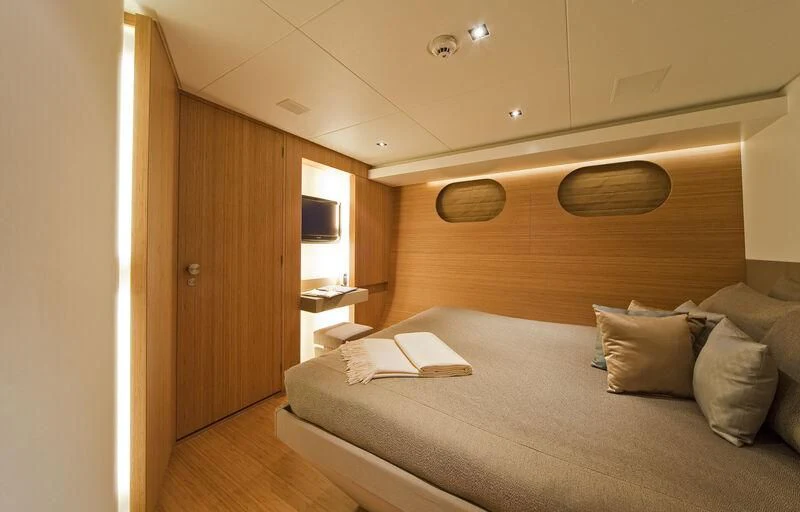 a bed in a room aboard JEMS Yacht for Sale