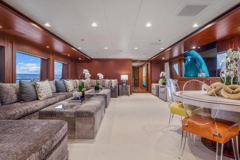 a living room with a couch and a table aboard ENDLESS SUMMER Yacht for Sale