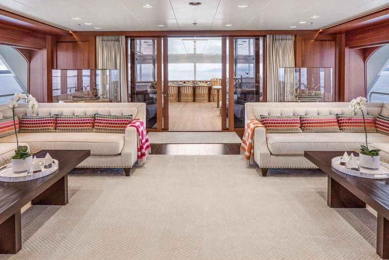 a living room with a couch and a table aboard ENDLESS SUMMER Yacht for Sale
