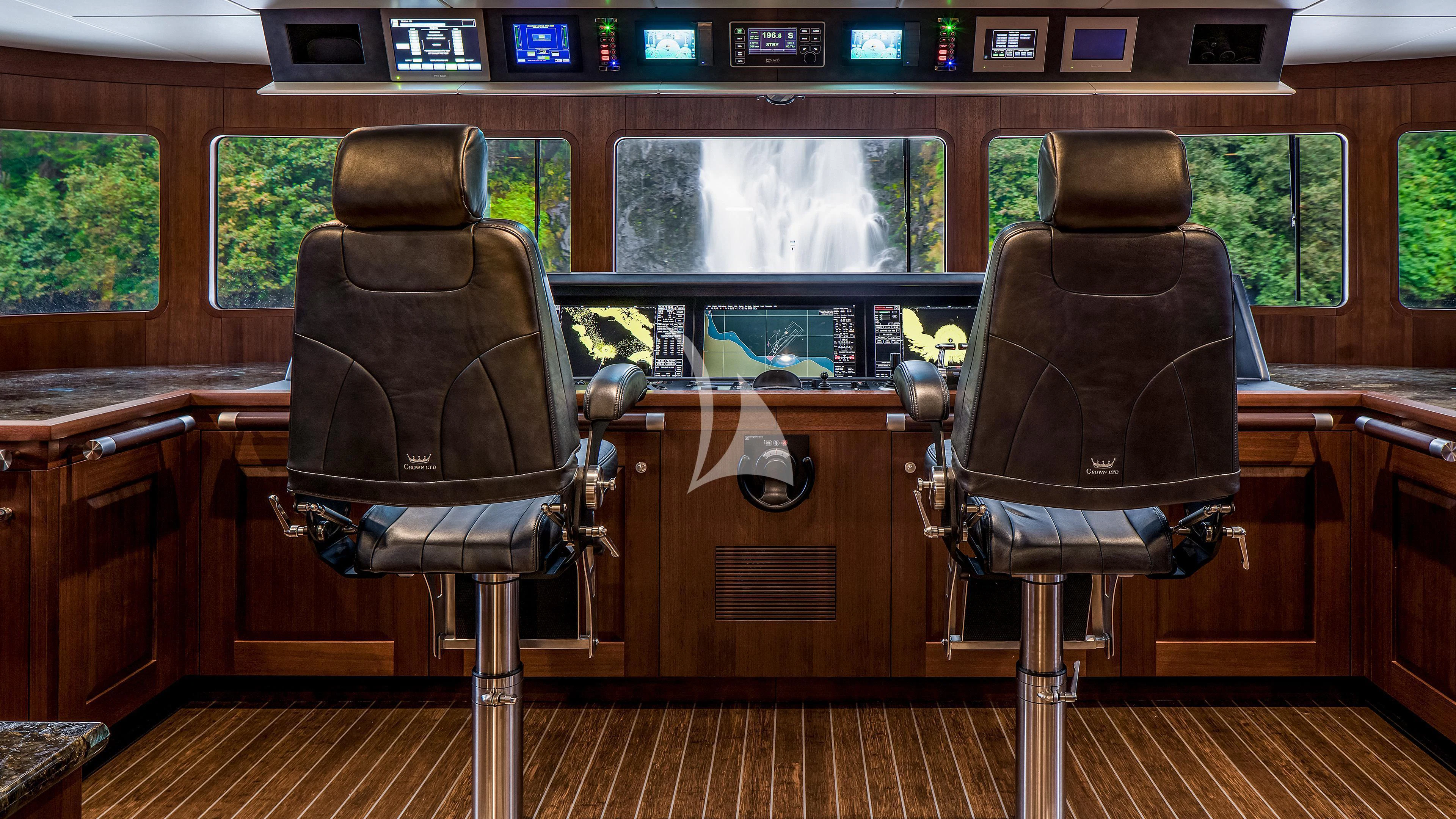 a couple of chairs in a train aboard ENDLESS SUMMER Yacht for Sale