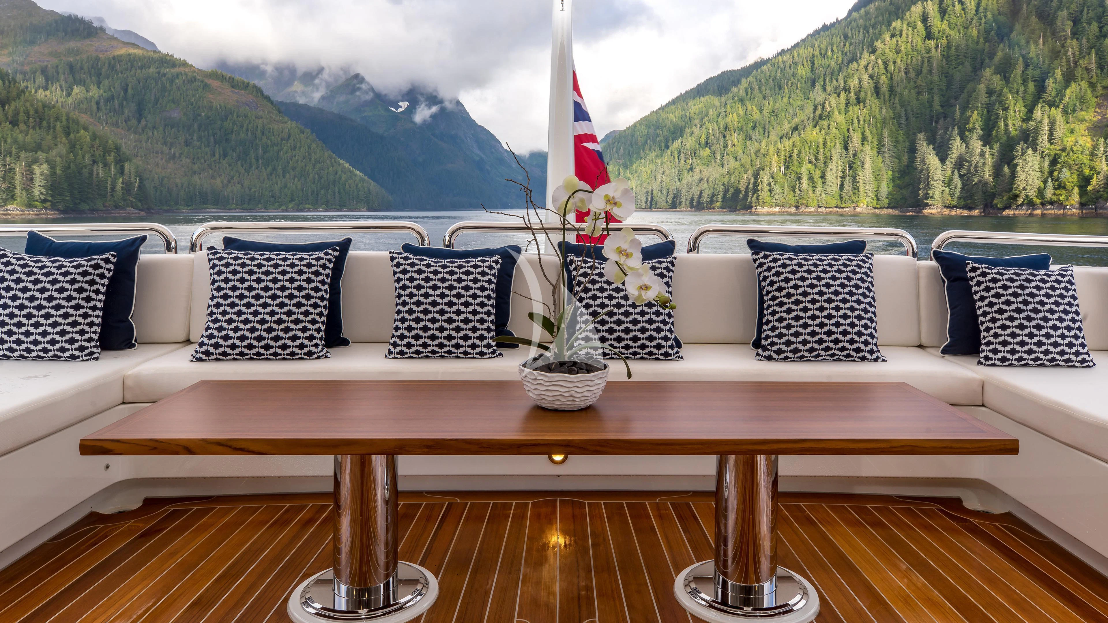 a table with pillows on it aboard ENDLESS SUMMER Yacht for Sale