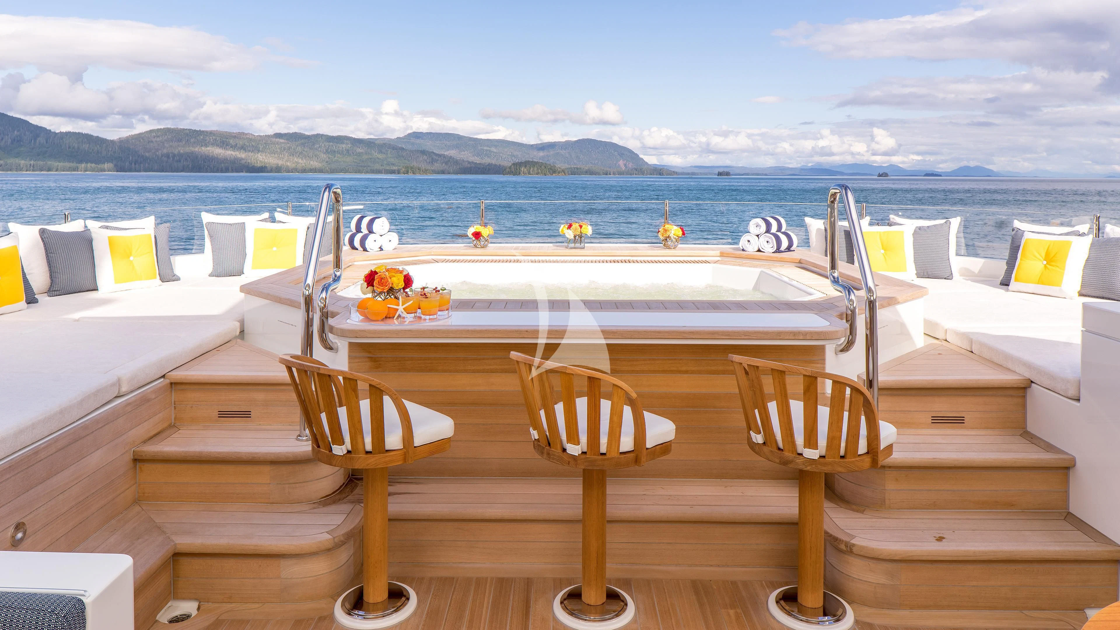 a room with a table and chairs aboard ENDLESS SUMMER Yacht for Sale