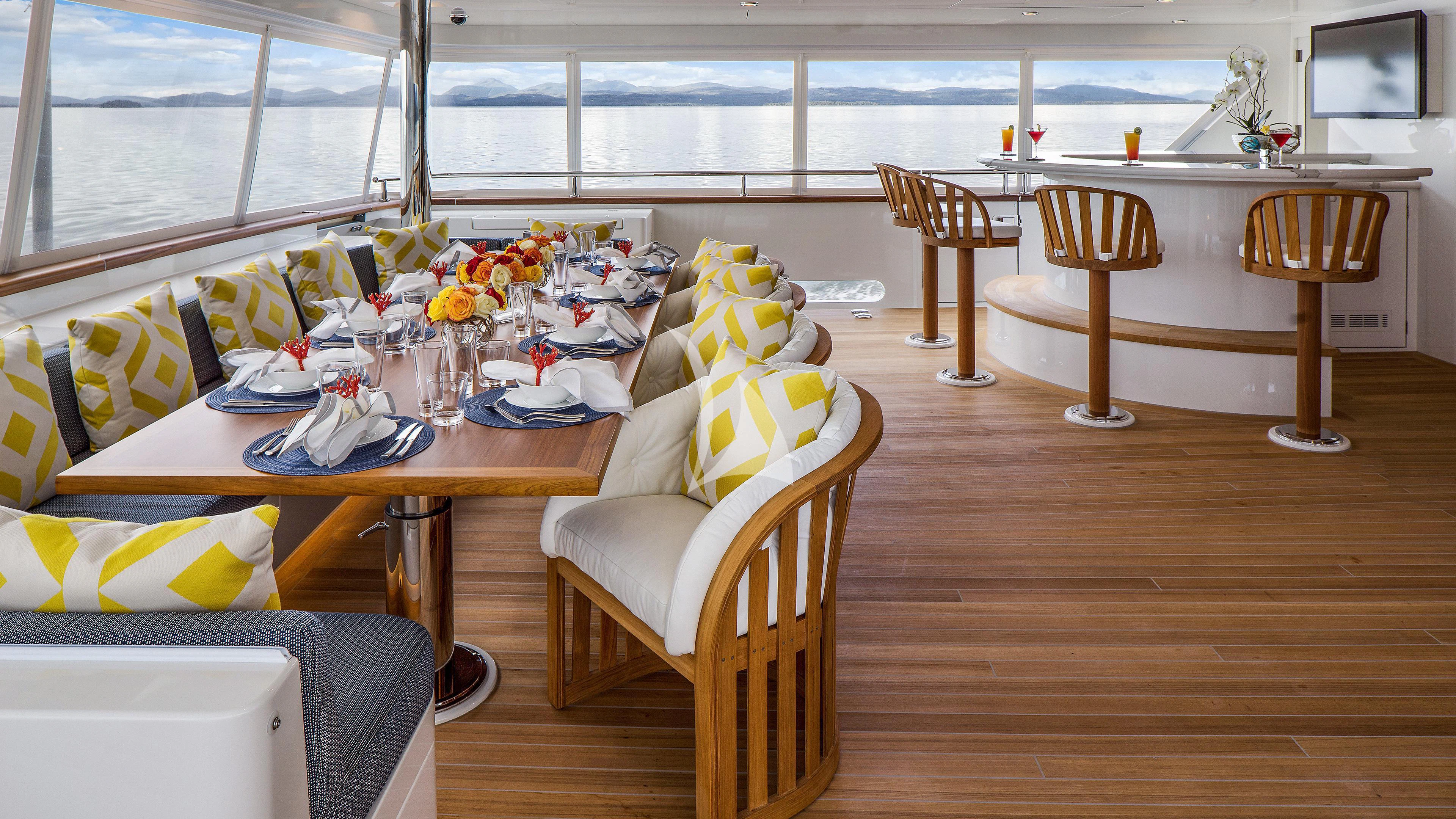 a living room with a wood floor aboard ENDLESS SUMMER Yacht for Sale