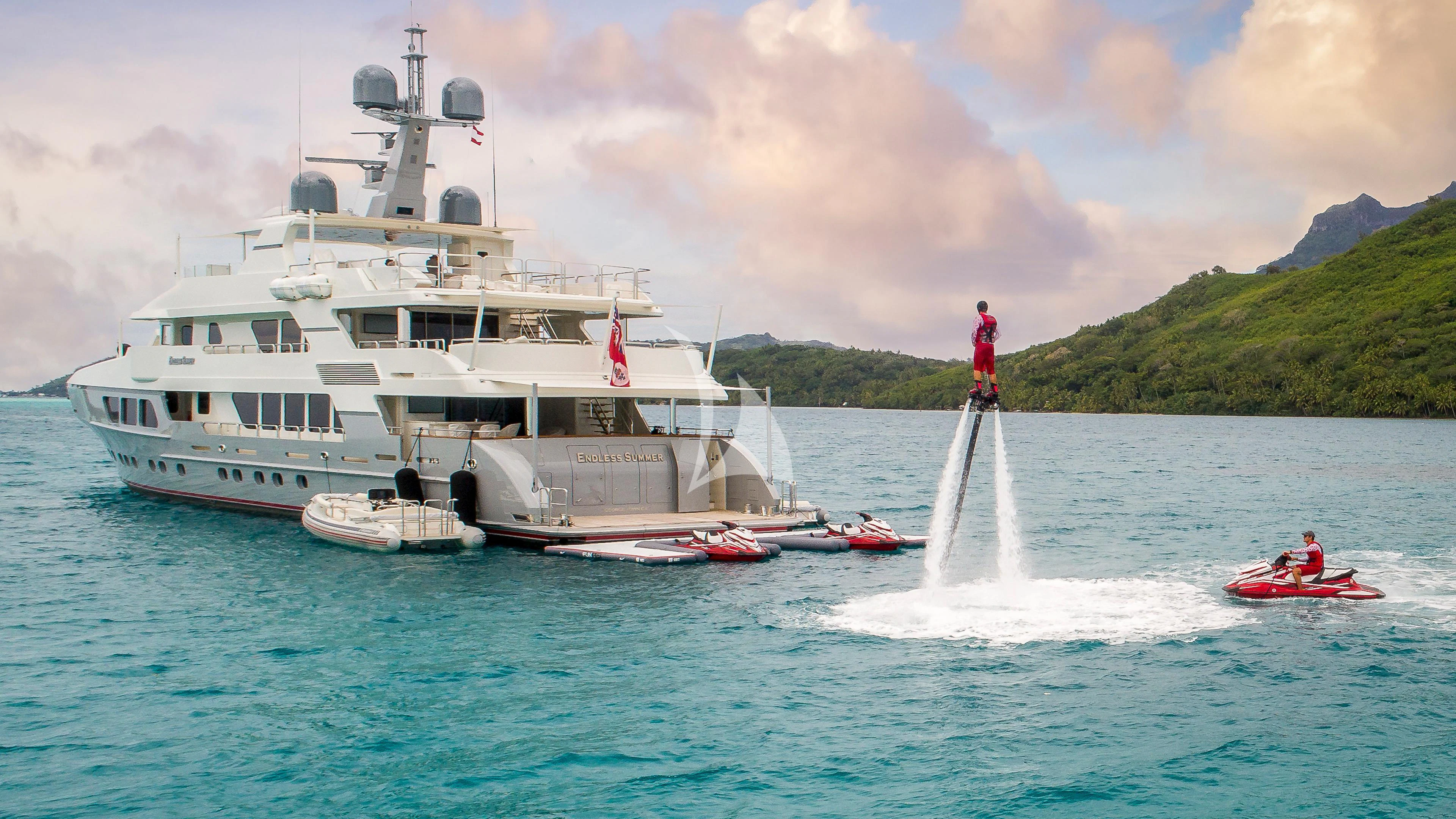 a boat sailing on the sea aboard ENDLESS SUMMER Yacht for Sale
