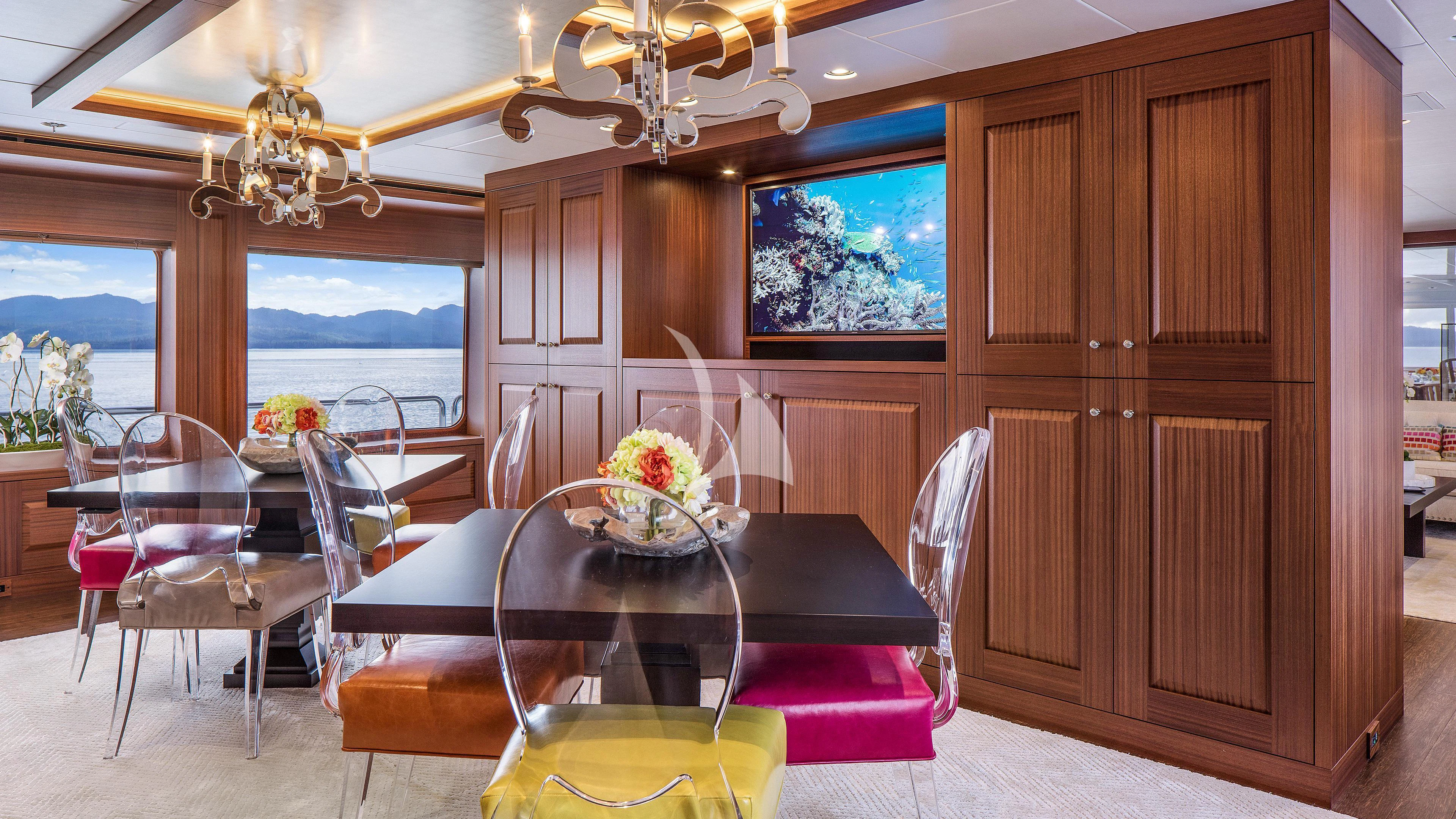 a room with a table and chairs aboard ENDLESS SUMMER Yacht for Sale