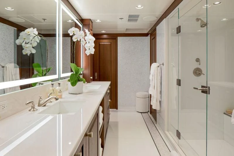 a bathroom with a large mirror aboard ENDLESS SUMMER Yacht for Sale