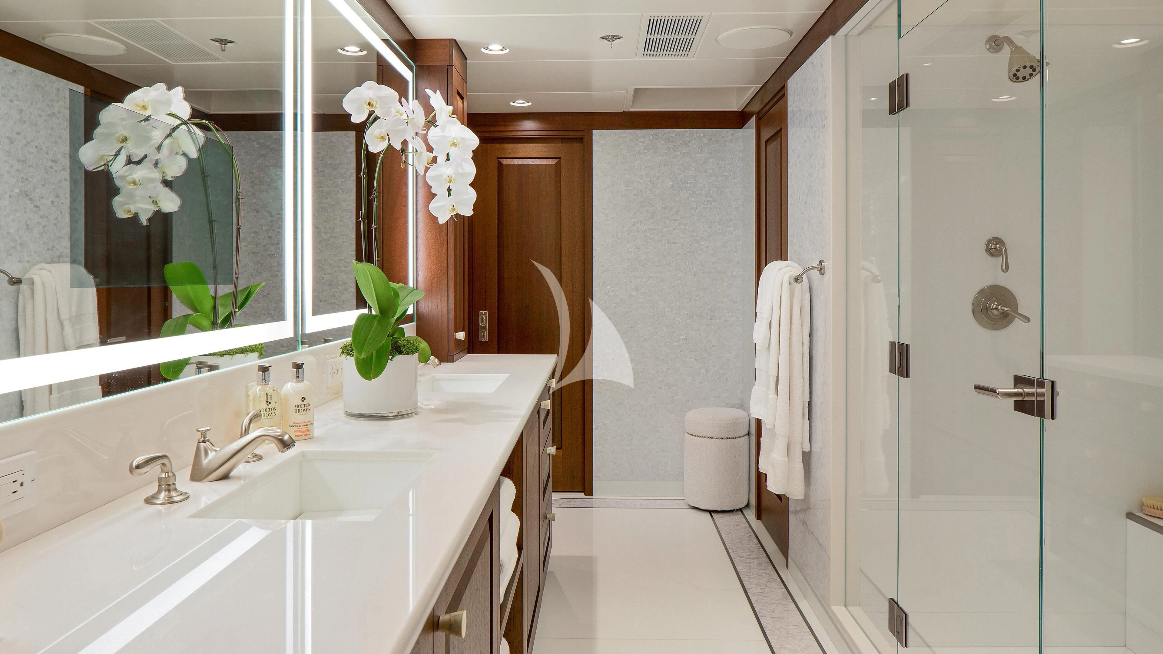 a bathroom with a glass shower aboard ENDLESS SUMMER Yacht for Sale