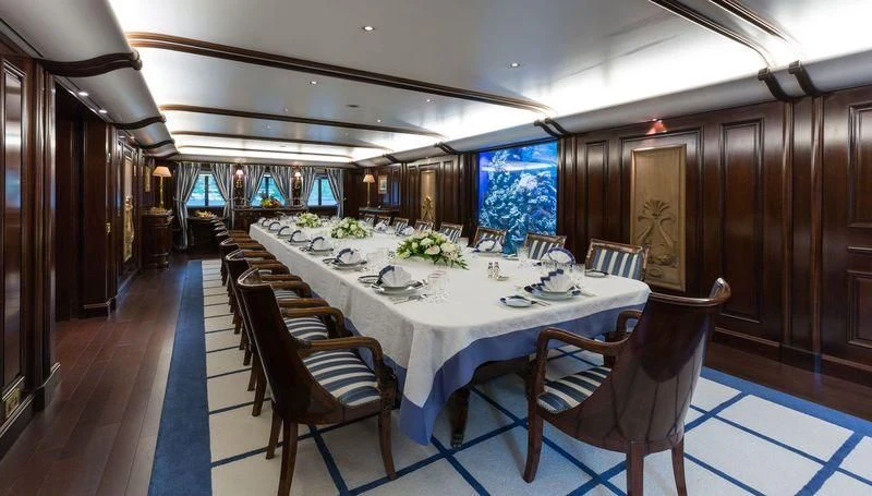 a dining table set for a dinner aboard GRAND OCEAN Yacht for Sale