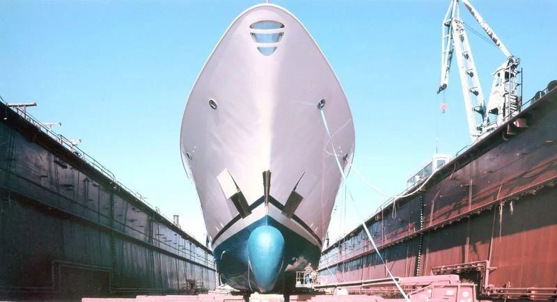 a large blue and red boat aboard GRAND OCEAN Yacht for Sale