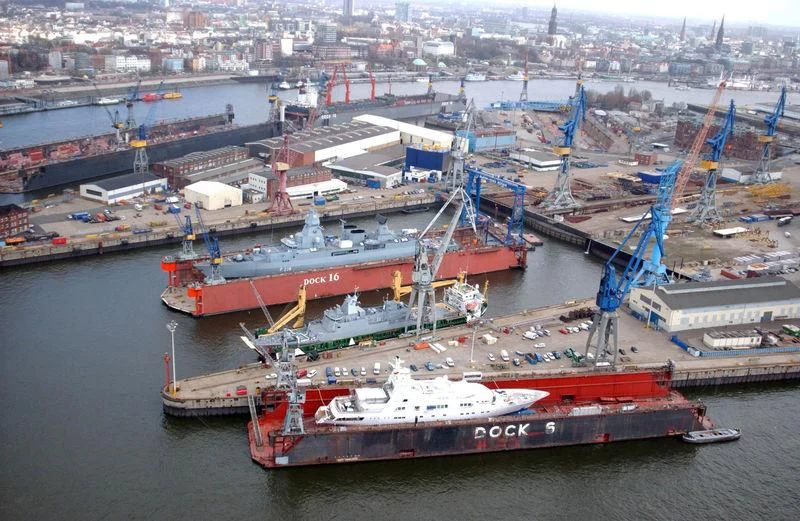 a large ship in a harbor aboard GRAND OCEAN Yacht for Sale