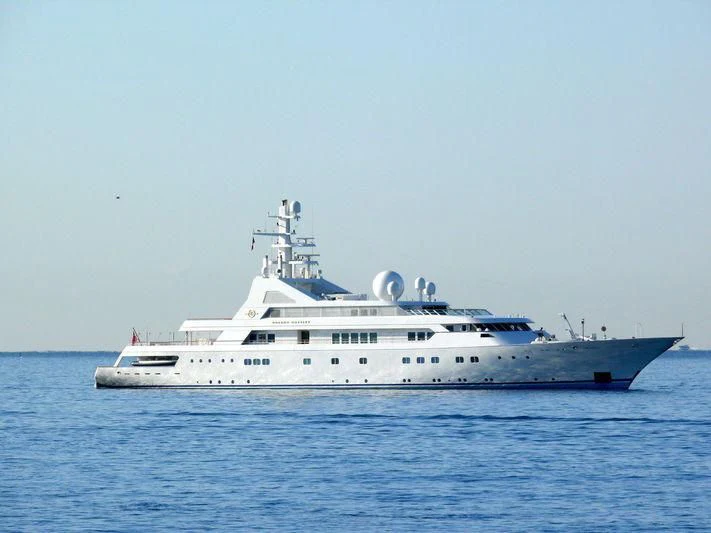 a large white boat in the water aboard GRAND OCEAN Yacht for Sale