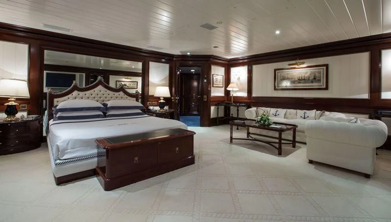 a large bedroom with a large bed aboard GRAND OCEAN Yacht for Sale