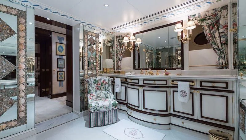 a bathroom with a large mirror aboard GRAND OCEAN Yacht for Sale