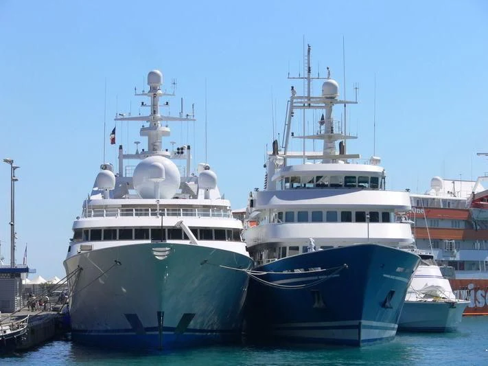 a couple of large boats in the water aboard GRAND OCEAN Yacht for Sale