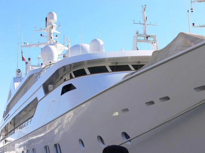 a white yacht with a blue sky aboard GRAND OCEAN Yacht for Sale