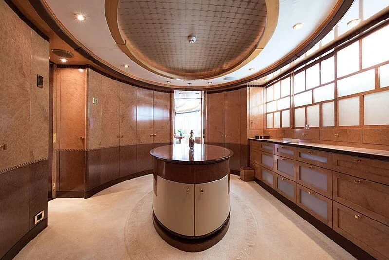 a room with a large round table aboard LUDZIE Yacht for Sale