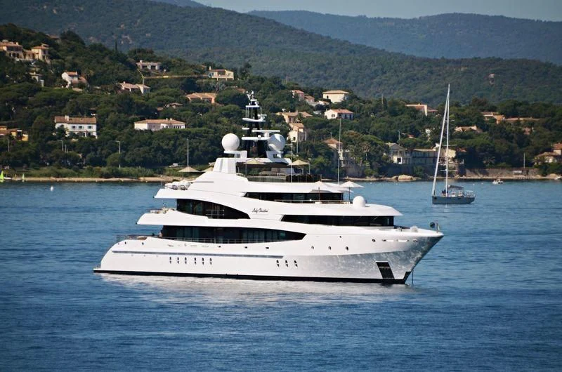 a white boat on the water aboard LUDZIE Yacht for Sale