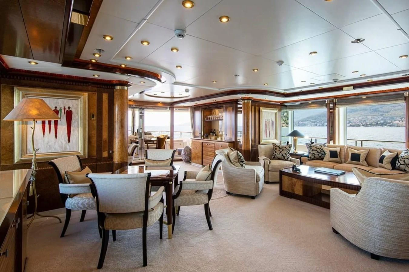a living room with a large window aboard LUDZIE Yacht for Sale