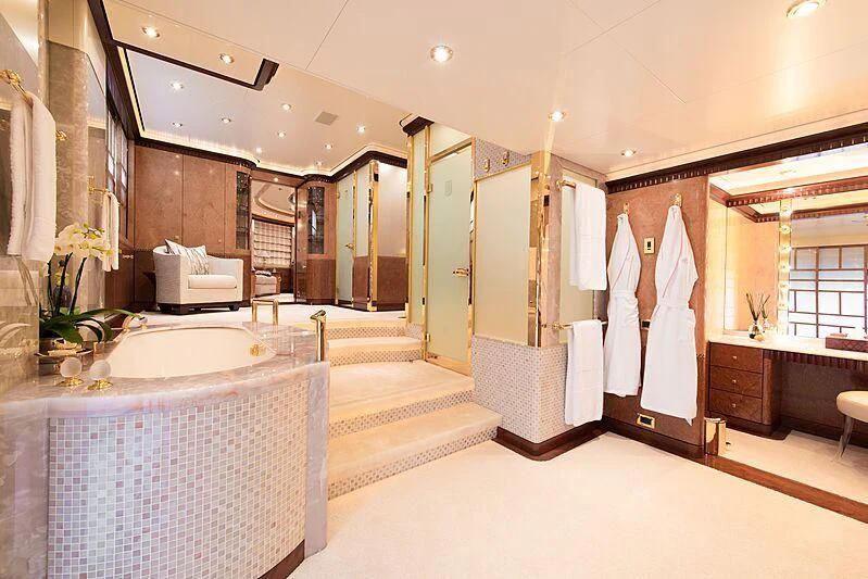a large bathroom with a large white bathtub aboard LUDZIE Yacht for Sale