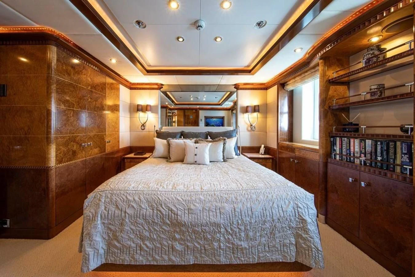 a bedroom with a large bed aboard LUDZIE Yacht for Sale