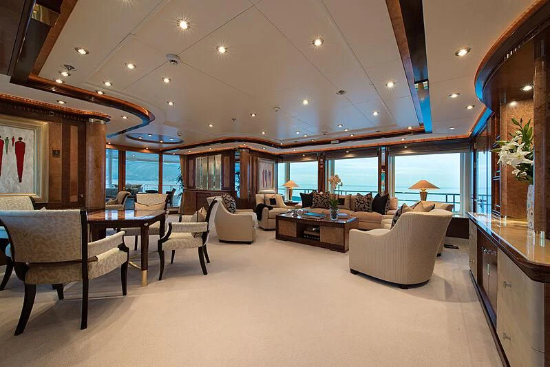 a large living room with a large window aboard LUDZIE Yacht for Sale
