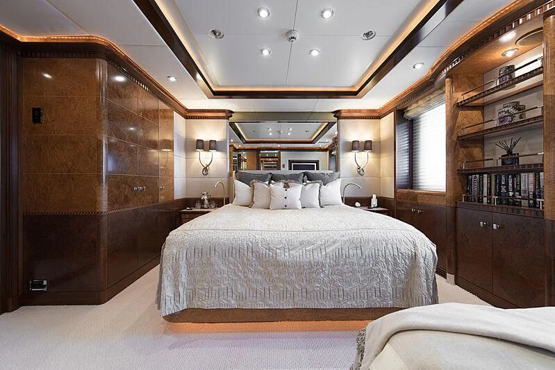 a bedroom with a large bed aboard LUDZIE Yacht for Sale