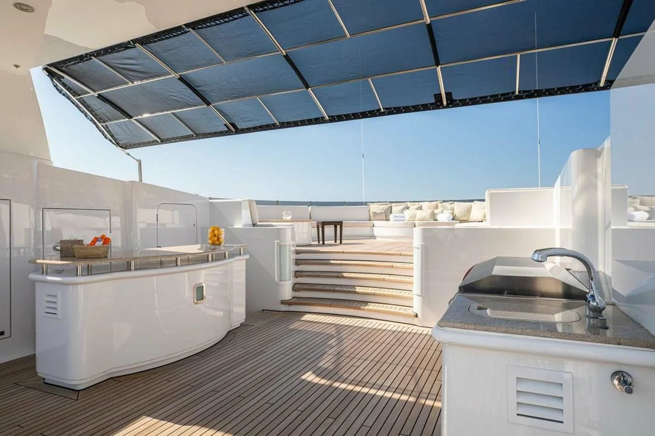 a kitchen with a sink and a large window aboard LUDZIE Yacht for Sale