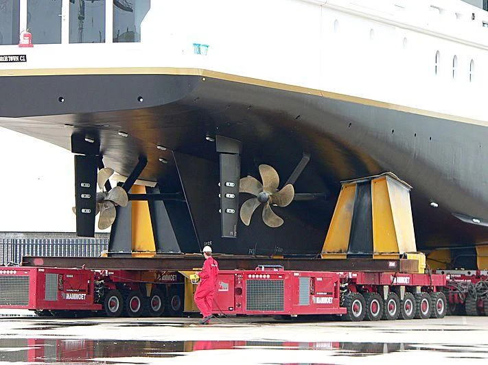 a toy train on a platform aboard LUDZIE Yacht for Sale