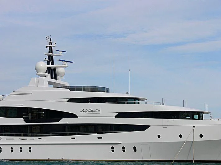 a white yacht with a satellite dish on top aboard LUDZIE Yacht for Sale