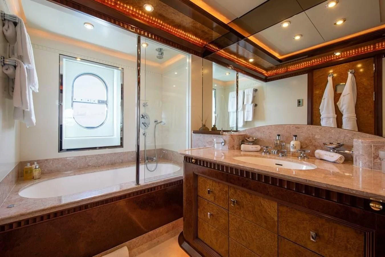 a bathroom with a large mirror aboard LUDZIE Yacht for Sale
