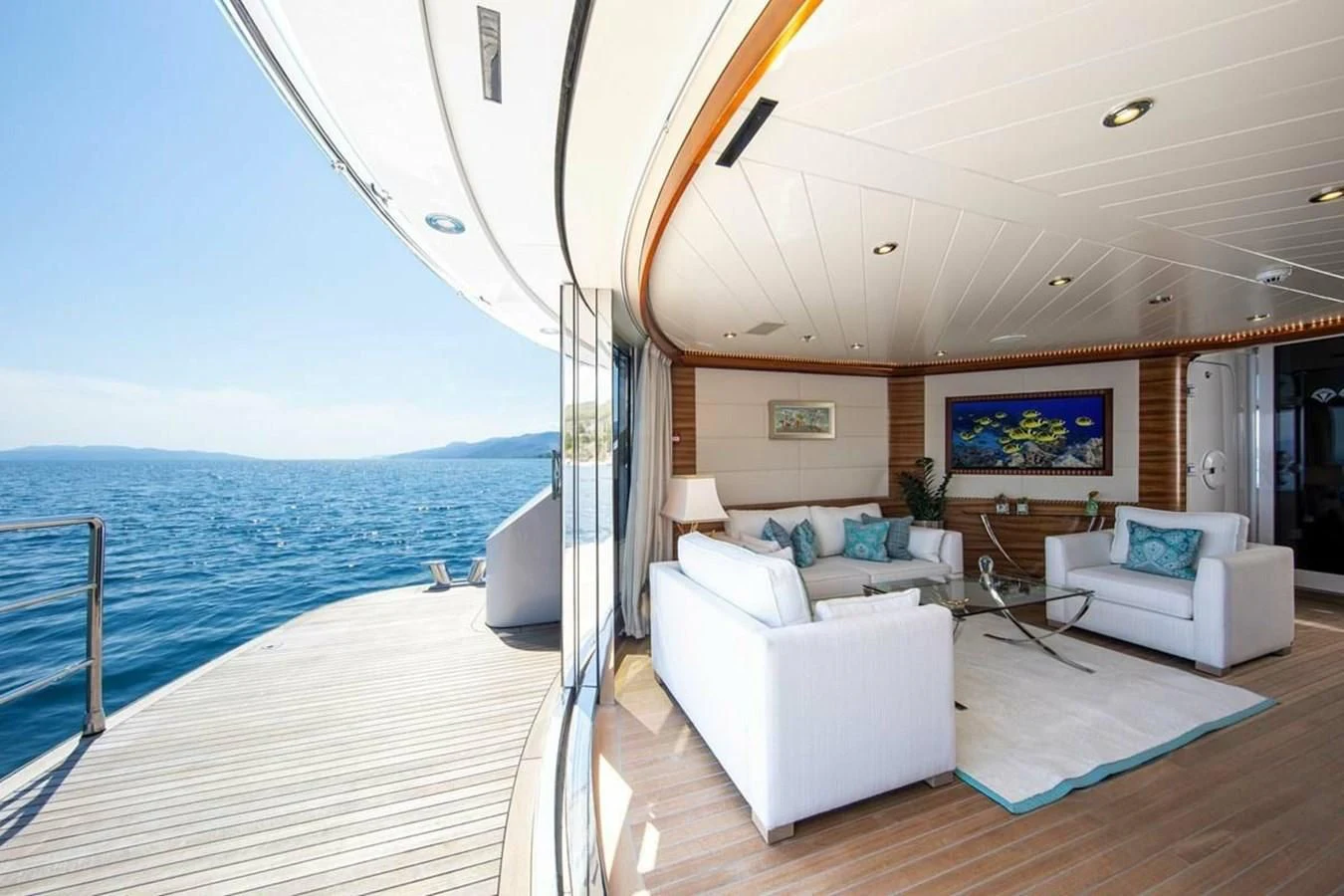 a large living room with a large ocean view aboard LUDZIE Yacht for Sale