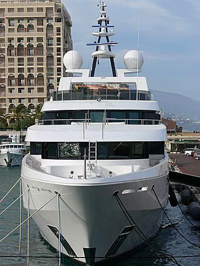 a large white boat in a harbor aboard LUDZIE Yacht for Sale