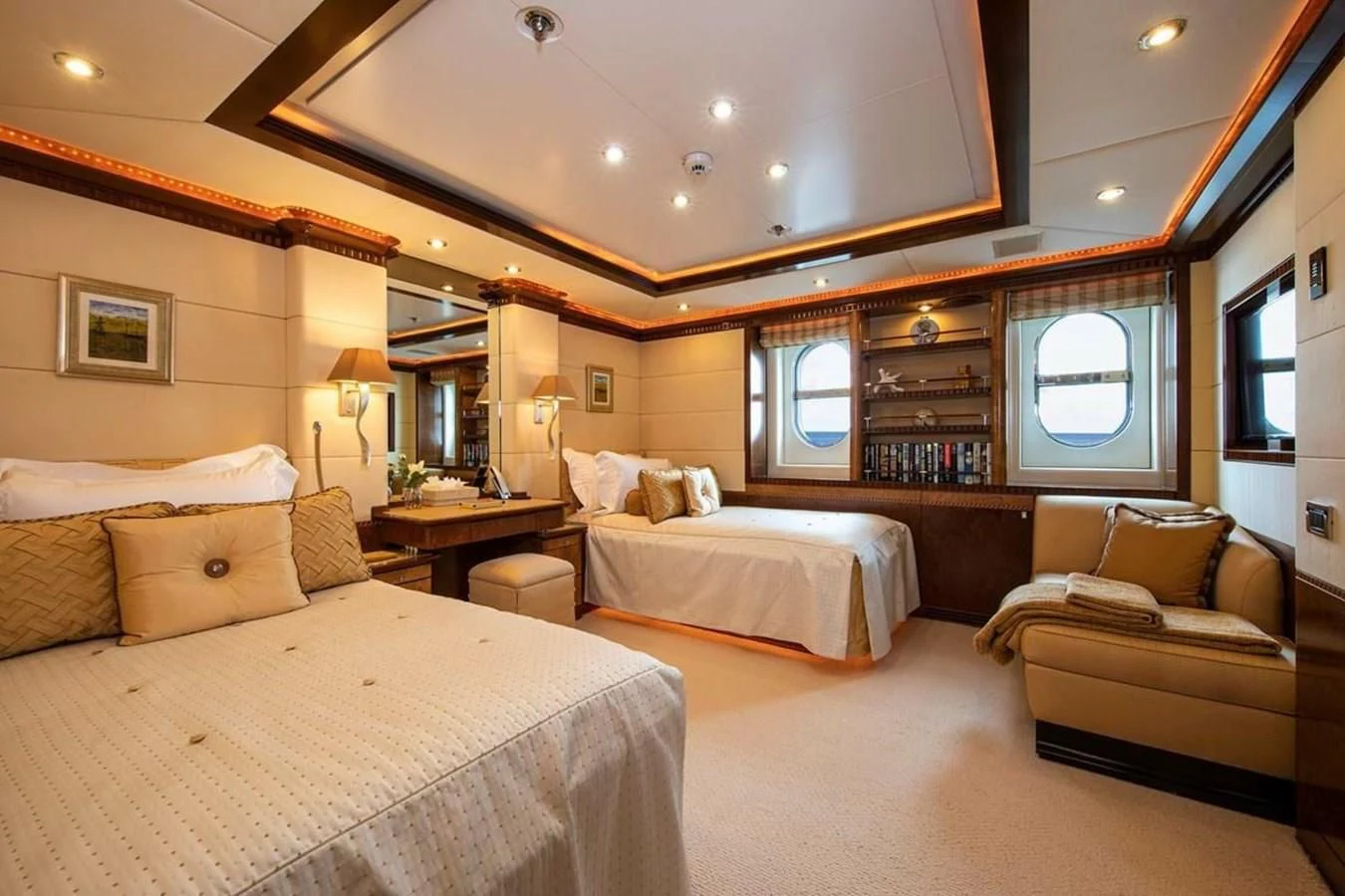a room with a bed and a couch aboard LUDZIE Yacht for Sale