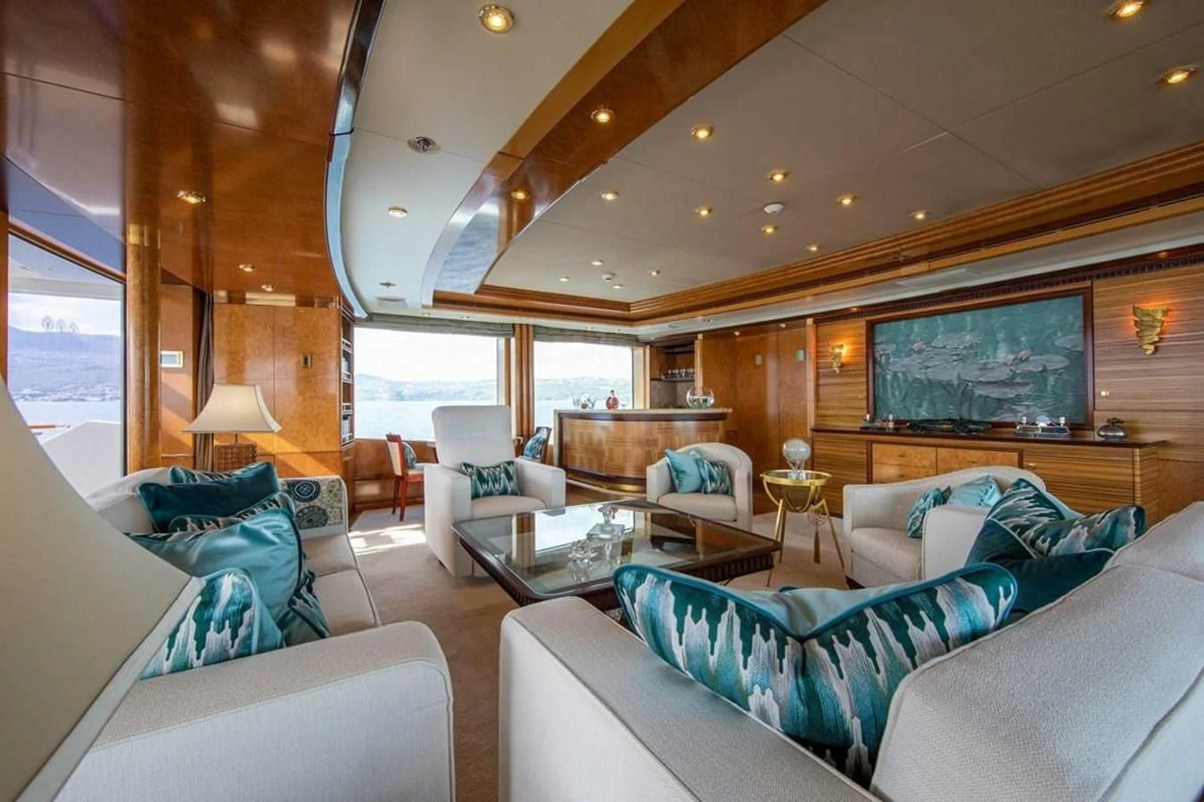 a living room with a large window aboard LUDZIE Yacht for Sale
