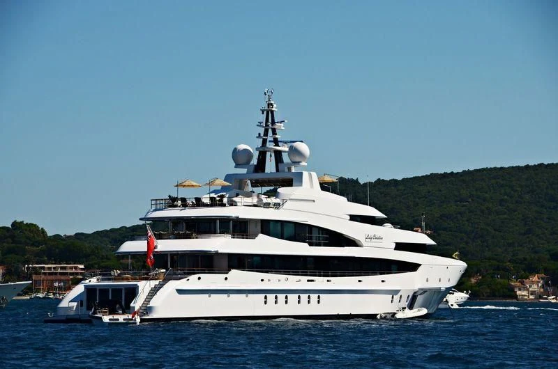 a large white boat in the water aboard LUDZIE Yacht for Sale