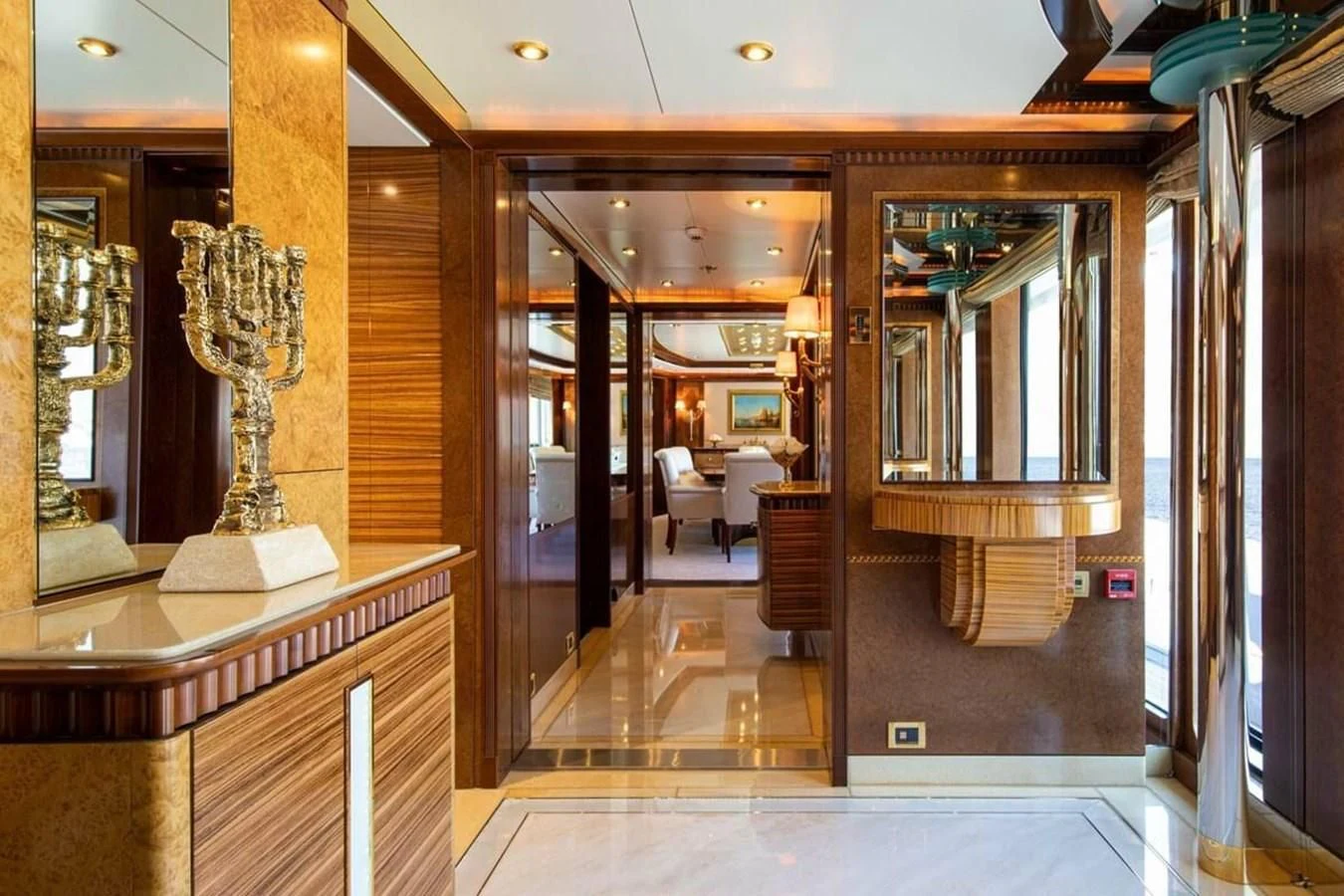 a large room with a glass door aboard LUDZIE Yacht for Sale