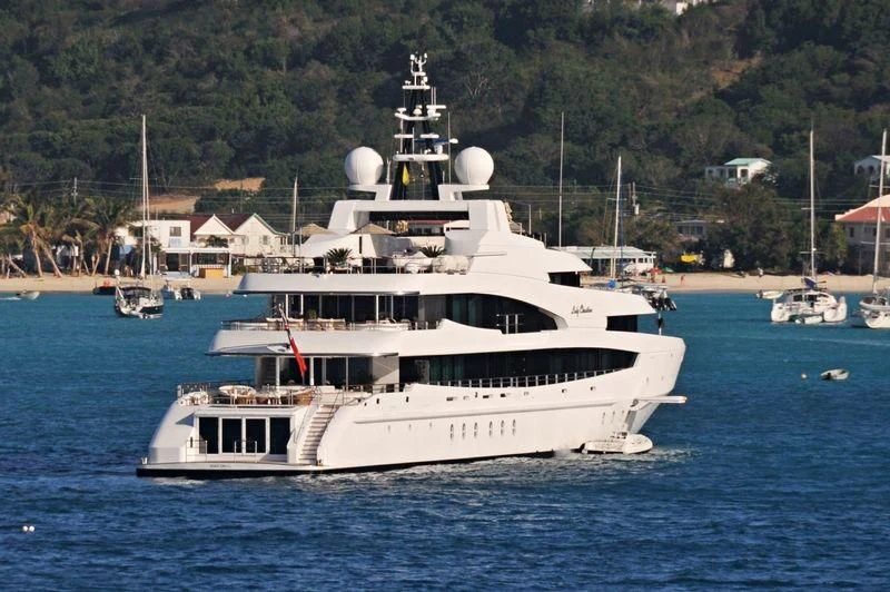 a white boat on the water aboard LUDZIE Yacht for Sale