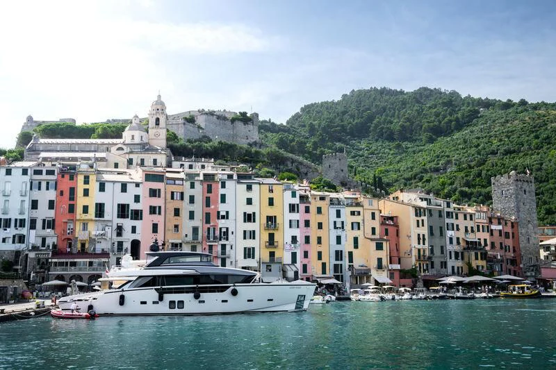 a boat in the water by Porto Venere aboard LUAR Yacht for Charter