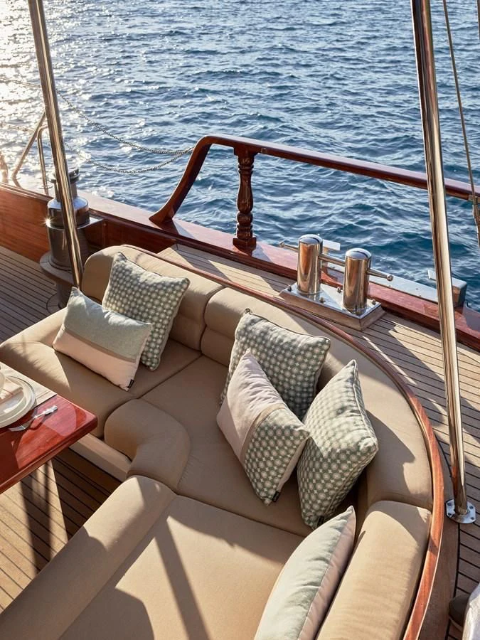 a boat with pillows on a body of water aboard KAFTAN Yacht for Sale