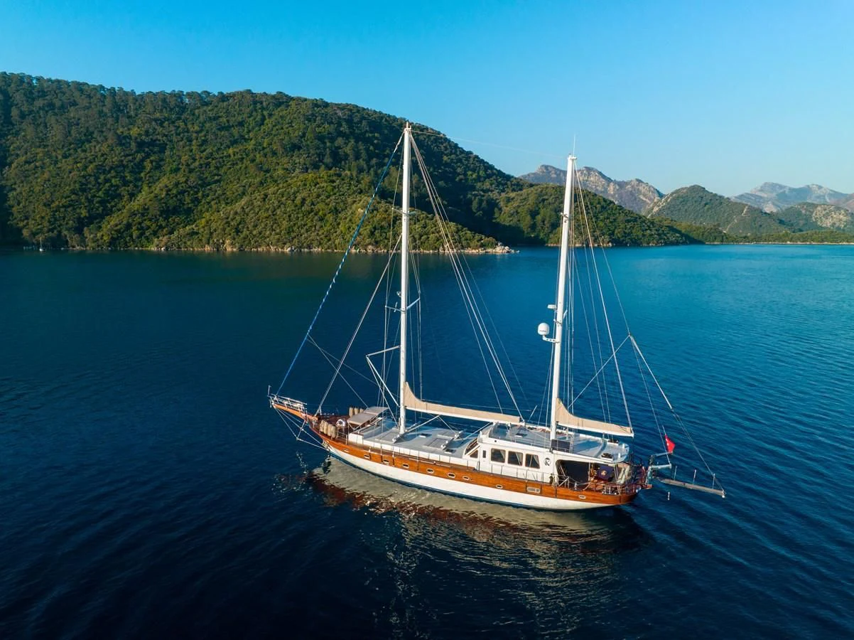 a boat sailing on the water aboard KAFTAN Yacht for Sale