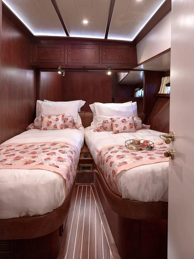 a couple of beds in a room aboard KAFTAN Yacht for Sale