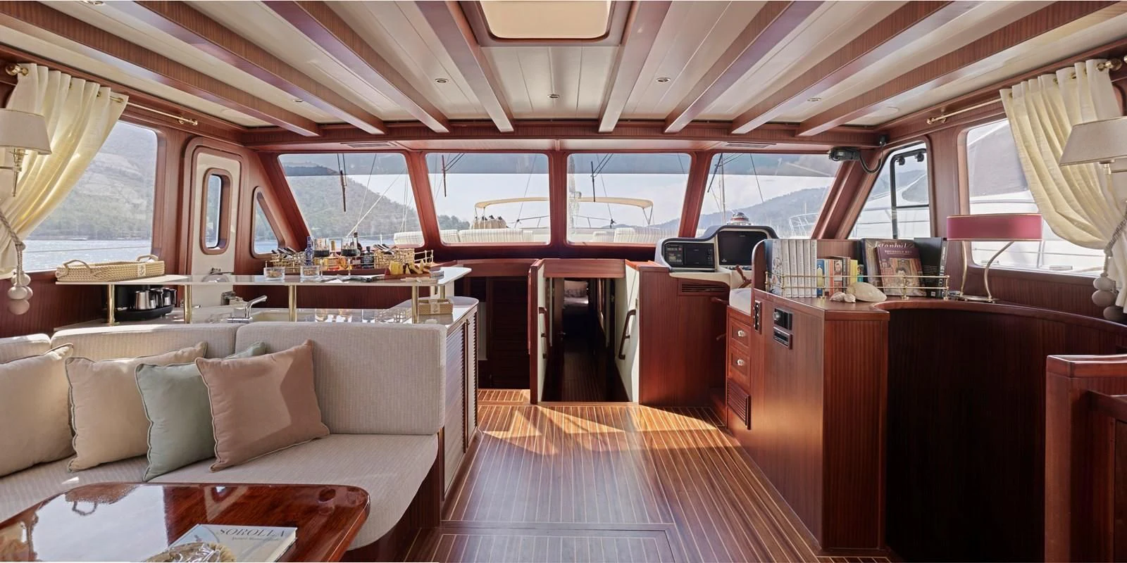 a boat with a large deck aboard KAFTAN Yacht for Sale
