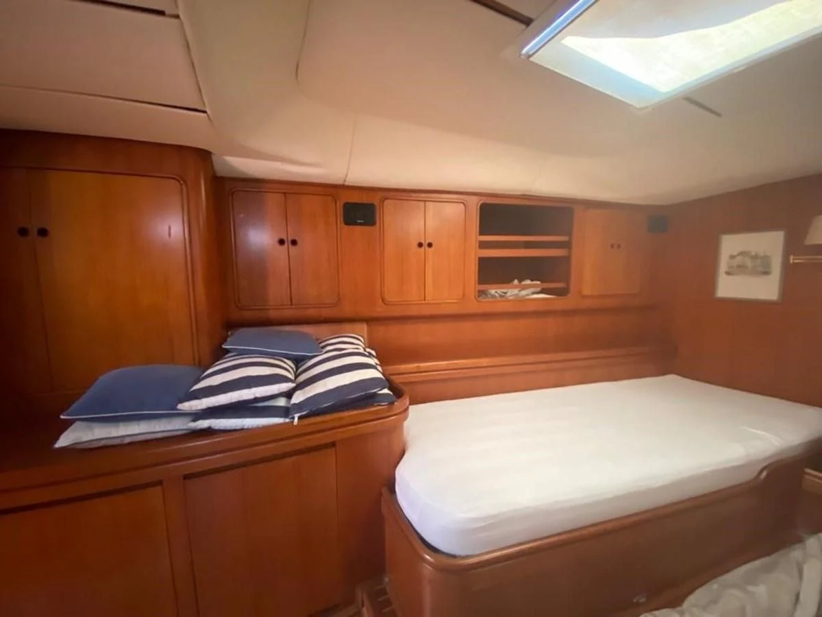 a room with bunk beds aboard BLUE WING Yacht for Sale