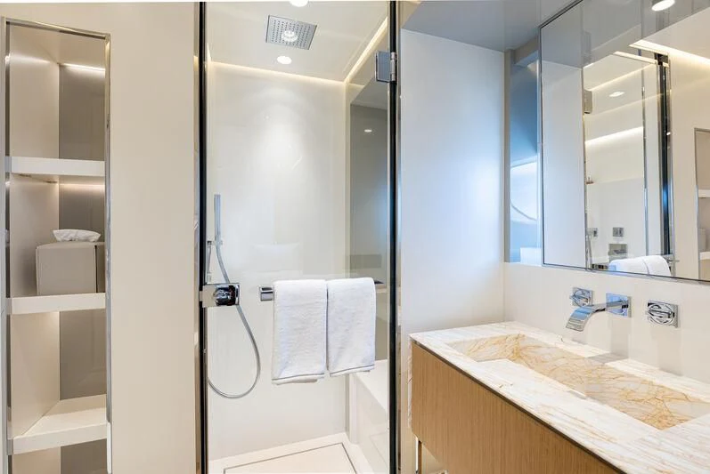 a bathroom with a shower unit and sink aboard IL SOGNO Yacht for Sale