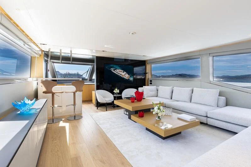 a living room with a couch and a table aboard IL SOGNO Yacht for Sale